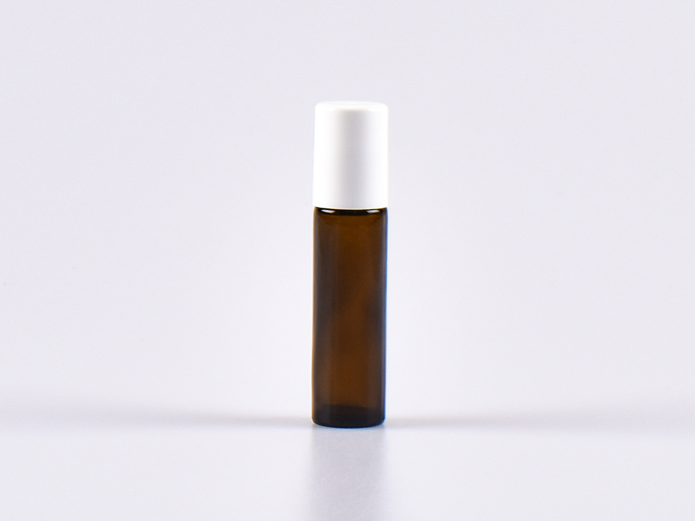 Braunglasflasche mit Deckel weiss